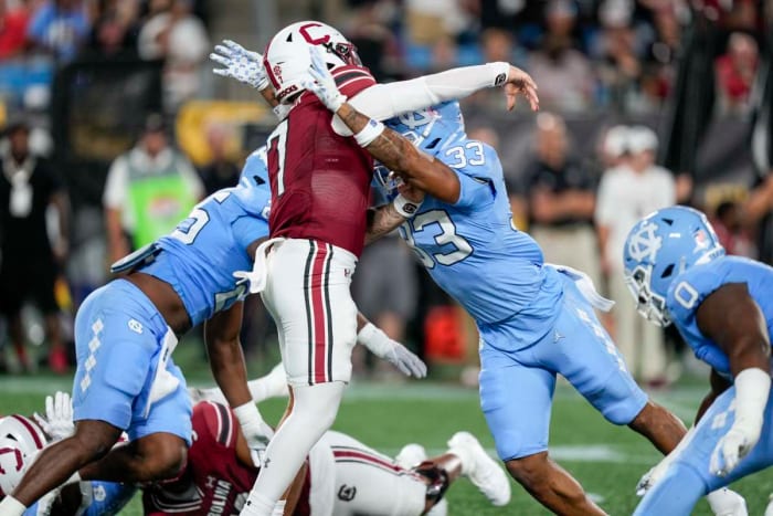 Rattler taking a shot from a North Carolina pass rusher after getting a throw off (2nd Sept., 2023)
